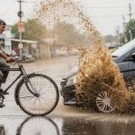 Speeding Car Splashes Mud on Cyclist; Karma Strikes in Seconds!