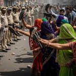Uproar flares in UP over AAP leader's death: Ruckus, stone-pelting, and veiled women flash slippers at police.