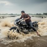 Life risked! Biker's 'hero' attempt on waterlogged bridge backfired heavily.