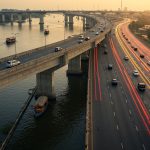 Is it a bridge or a miracle? Where boats are above the water and vehicles speed below!