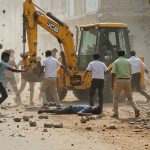 Budaun: Stone-pelting on team removing illegal encroachment, vehicles vandalized, youth injured after being hit by JCB - What happened and why?