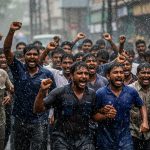 Power workers, drenched in rain, thunder against privatization: Vow to continue protest