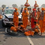 Major Accident in Hathras: Out-of-control car collides with Kanwariya group after tire burst, three injured.
