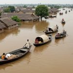 Kanpur: Katri villages completely surrounded by floodwaters, boats used for transportation.