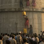 Lecturer Recruitment Exam Controversy Intensifies: Girl Students Climb Tank, Threaten Self-Immolation With Petrol; Administration Panics