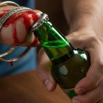 Clever Trick Backfires: Man Left Bleeding After Opening Beer With Bracelet, Video Goes Viral