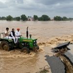 Raging Yamuna in Mathura: Road Swept Away by Strong Current, DM-ADM Arrive by Tractor; Photos Go Viral