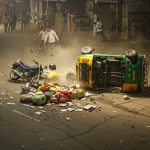 Terrifying Scene! Caught on CCTV: Motorcyclist Hits Auto, Auto Flips, Goods Scattered