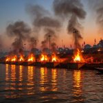 Flood fury in Varanasi: Ganga crosses warning mark for the third time; 12 pyres simultaneously ablaze at Manikarnika Ghat.