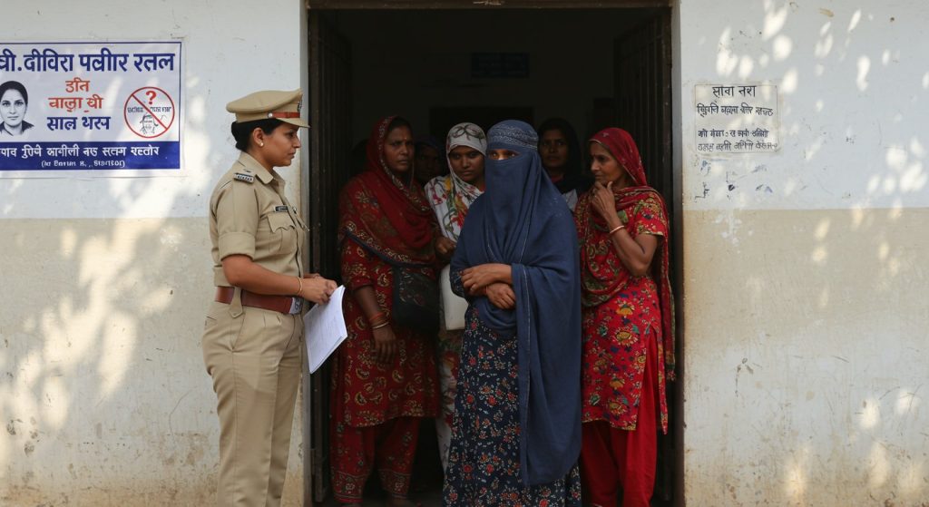 Samajwadi Party's strong objection to checking only burqa-clad women on polling day, called it against Election Commission rules.